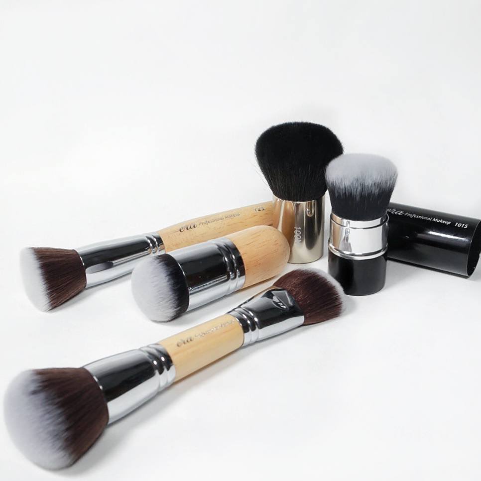 Professional makeup brush set arranged neatly on a clean background